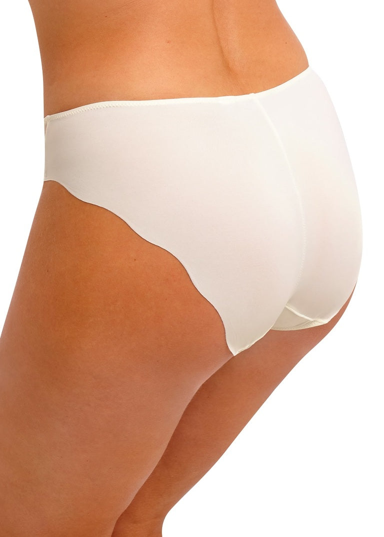 White underwear worn by a person on a white background available at Leia Lingerie
