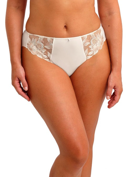 White lace underwear worn by a person on a white background available at Leia Lingerie